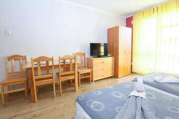 Фото номера Апартаменты-студио с балконом и кухней № 22 Апартаменты Apartamenty Częstochowa г. Ченстохова 3