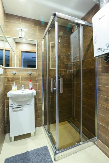 Фото номера Стандартные апартаменты № 8 с 2 спальнями и балконом Апартаменты Apartamenty Częstochowa г. Ченстохова 2