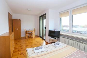 Фото номера Номер-студио №15 с балконом Апартаменты Apartamenty Częstochowa г. Ченстохова 3